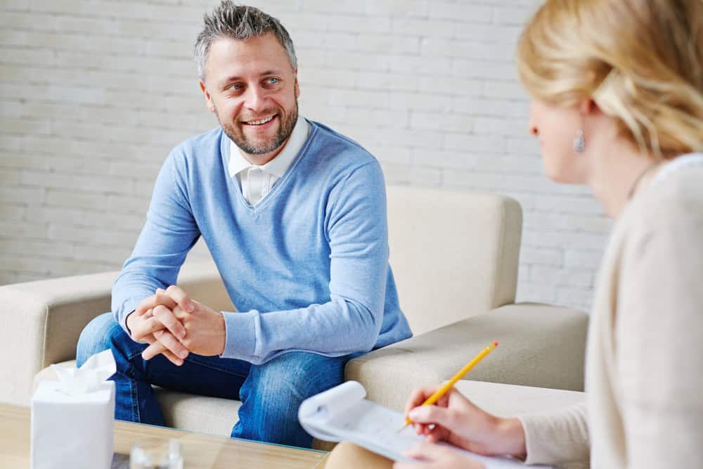 Happy,Patient,Talking,To,Psychologist